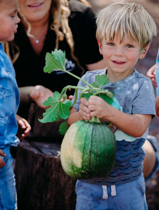 Boy Holding Melon